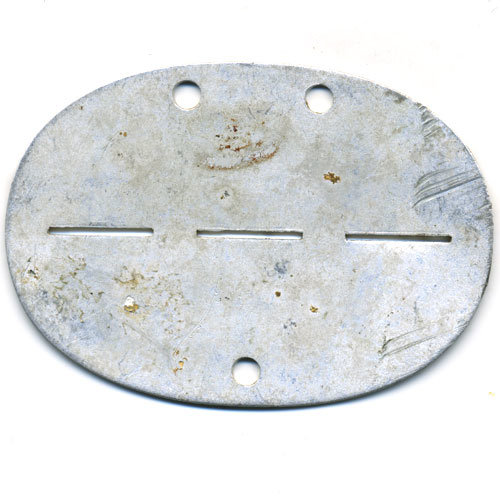 Личный жетон немецкого солдата или офицера периода Третьего Рейха. 