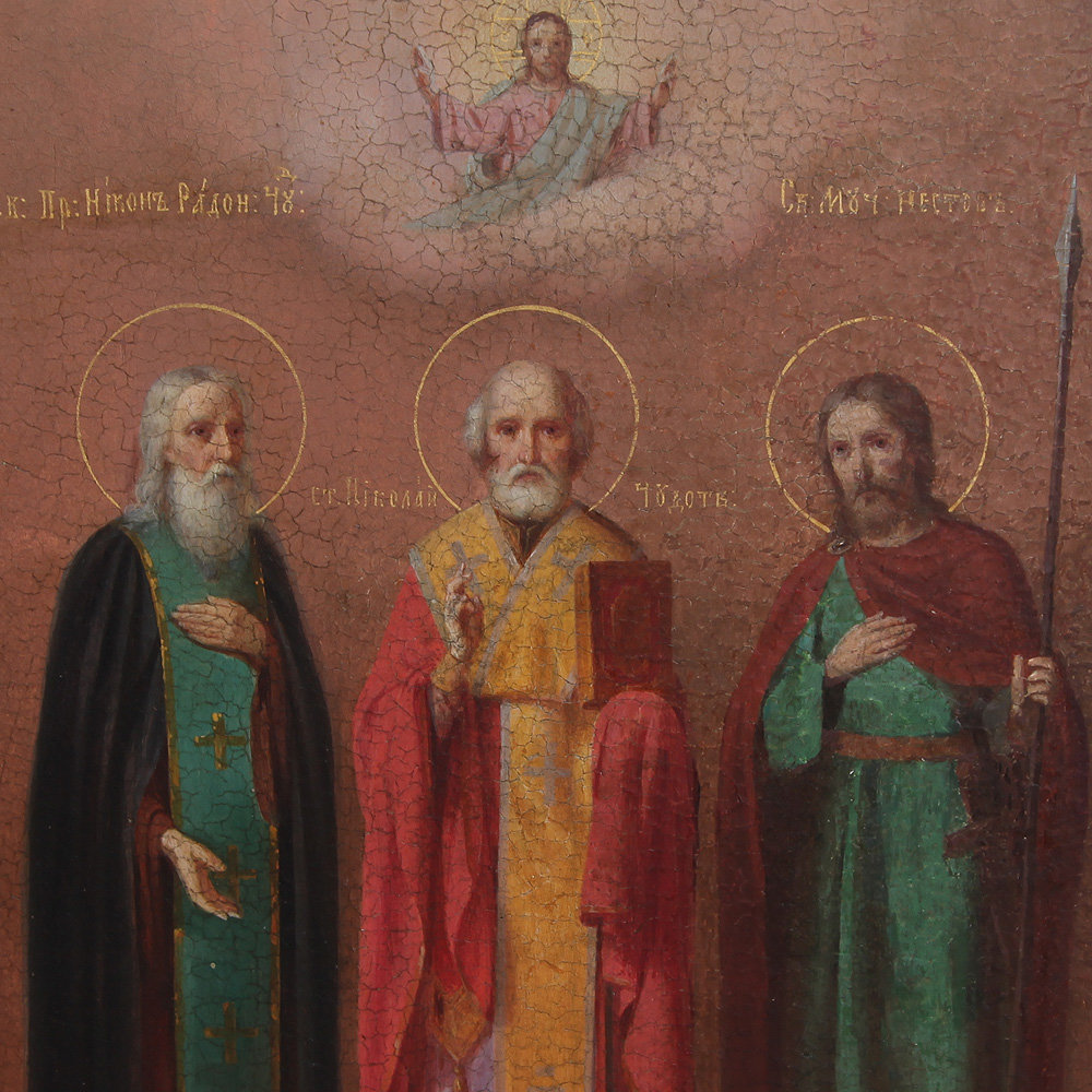Большая старинная икона 19 века с изображением трех святых: Святитель Николай Чудотворец, Преподобный Никон Радонежский Чудотворец и святой мученик Нестор Солунский.