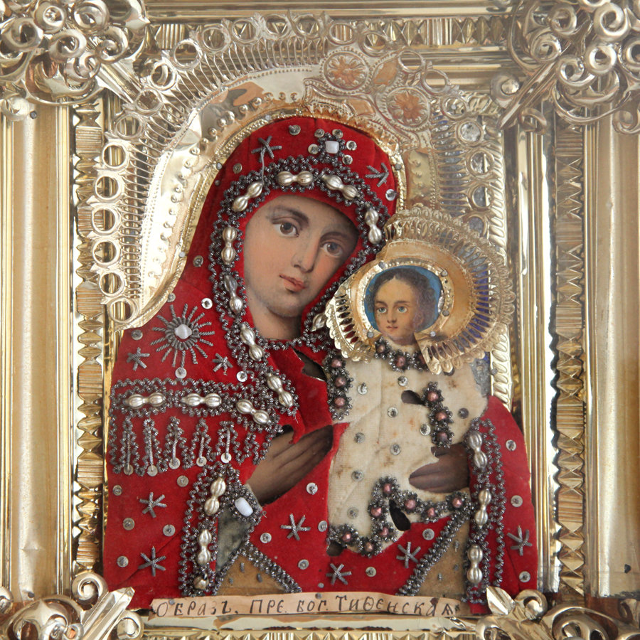 Старинная «Тихвинская икона Божией Матери - покровительница младенцев» в киоте. Россия XIX век.