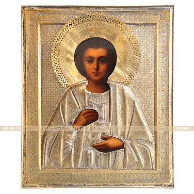 Старинная икона в посеребренном окладе 
