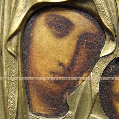 Большая старинная икона 19 века Пресвятая Богородица Казанская в золоченом объемном окладе.