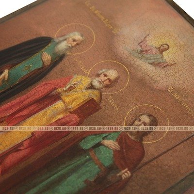Большая старинная икона 19 века с изображением трех святых: Святитель Николай Чудотворец, Преподобный Никон Радонежский Чудотворец и святой мученик Нестор Солунский.