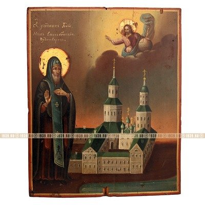 Старинная икона Святой угодник Божий преподобный Нил Столбенский Чудотворец на фоне Нило-Столобенского монастыря, в посеребренном окладе.