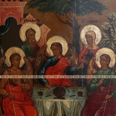 Старинная икона Святая Троица с Саррой и Авраамом и приписными святыми и Ангелом–хранителем на полях. Россия, Поволжье, XIX  век.