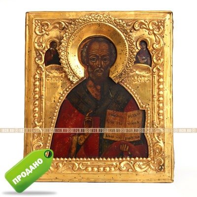 Старинная деревянная икона в открытом золоченом окладе святитель Николай Чудотворец. Россия, XIX век.