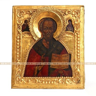 Старинная деревянная икона в открытом золоченом окладе святитель Николай Чудотворец. Россия, XIX век.