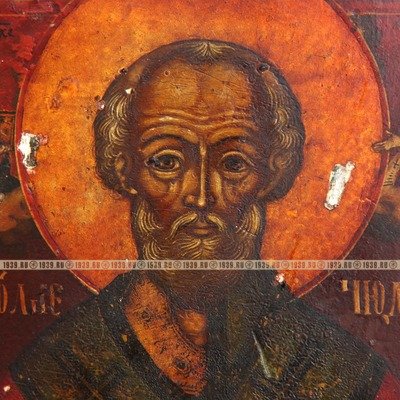 Старинная деревянная икона в открытом золоченом окладе святитель Николай Чудотворец. Россия, XIX век.