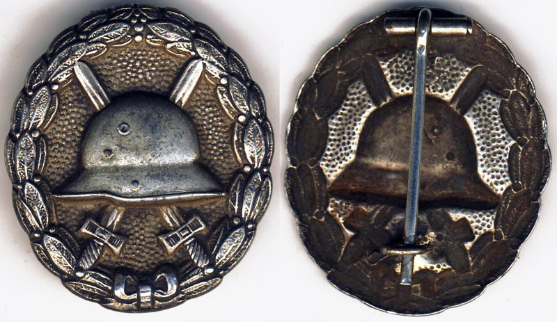 Деньги за ранение. Знак за ранение в ПМВ серебро. Знак за ранение в первую мировую. Знаки первой мировой войны. Символ первой мировой.